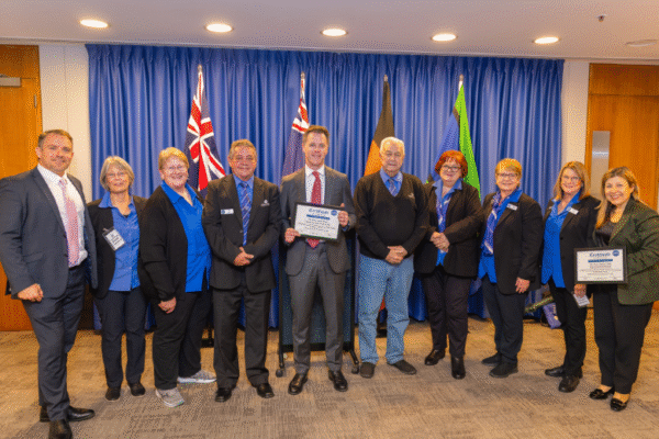 Kate Wilcockson, Elizabeth Schenk, John Limpus, Premier Chris Minns, Barry Robson, Jenny Lord, Kate Robson, Karen Martin, Minister Sophie Cotsis